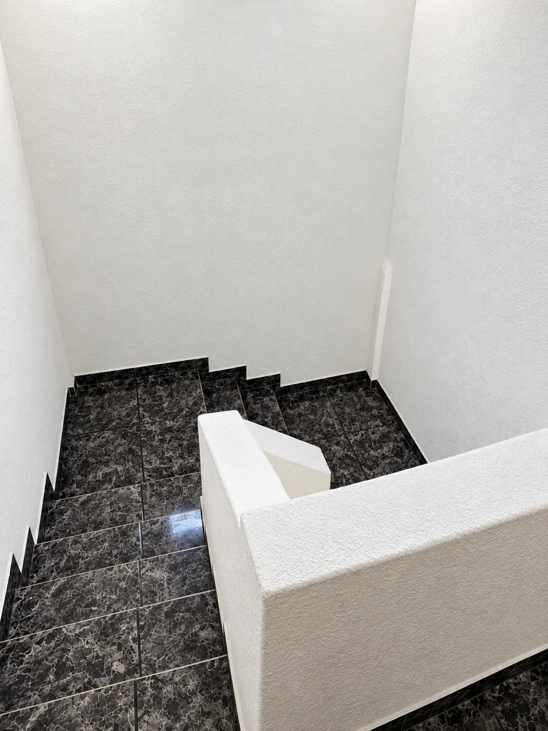 Escaleras interiores de Compás 38